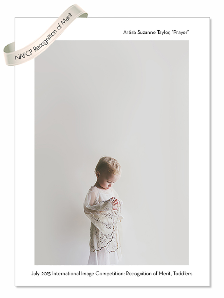 Young girl dressed in a white dress against a white wall praying wins merit award.