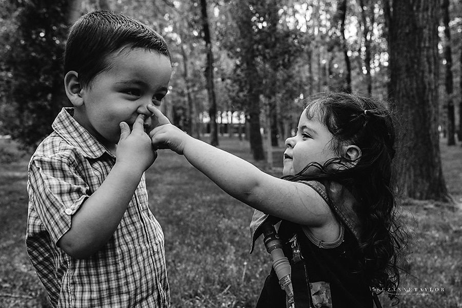 You have to love kids that love their noses. Twins captured in Calgary, Alberta with Suzanne Taylor Photography. 