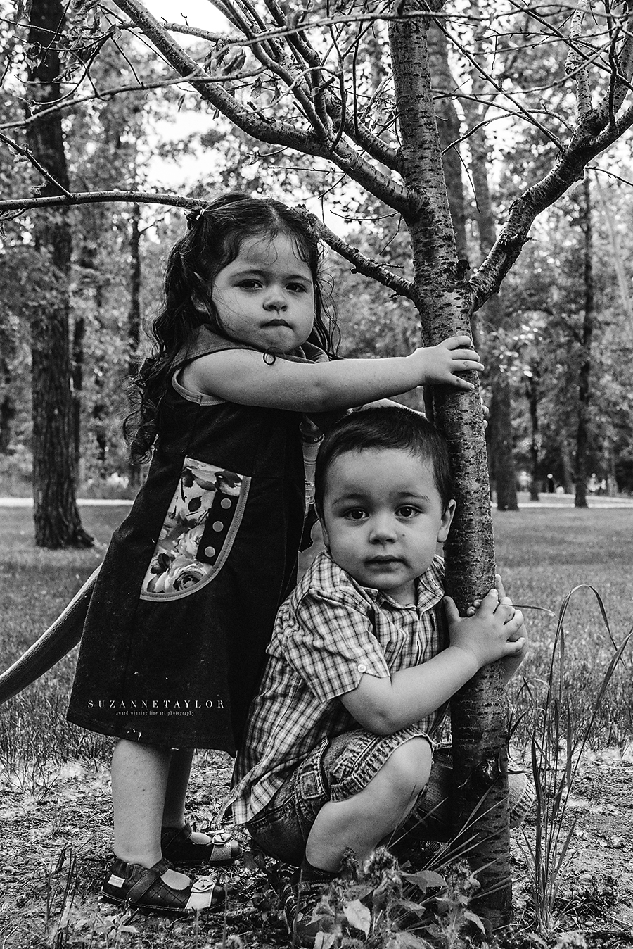 These two twins love each other immensely in Calgary, Alberta with Suzanne Taylor Photography. 