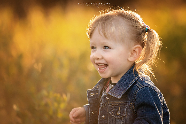 Calgary Family Photographer Suzanne Taylor Photography captures a young family at Fish Creek Park.