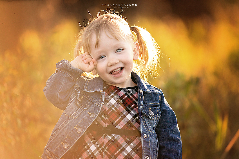 Calgary Family Photographer Suzanne Taylor Photography captures a young family at Fish Creek Park.